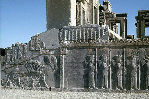 Iran, formerly Persia, Persepolis, capital of the Achaemenid Empire, frieze on palace of Darius I, begun 515 BC, armed men and lion killing a bull